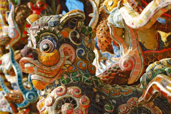 Mosaic Sculptures Details of a Buddhist Temple in a village near Da Lat, Vietnam