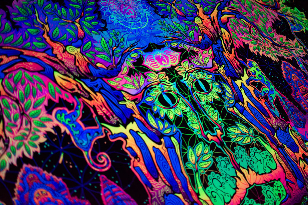Hanuman UV-Reactive Tapestry Backdrop Details Closeup in Fluorescent Light